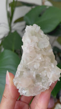 Load and play video in Gallery viewer, CLEAR &amp; VERY PALE GREEN APOPHYLLITE WITH PEACH STILBITE | 3.9 x 7.1cm | 108grams
